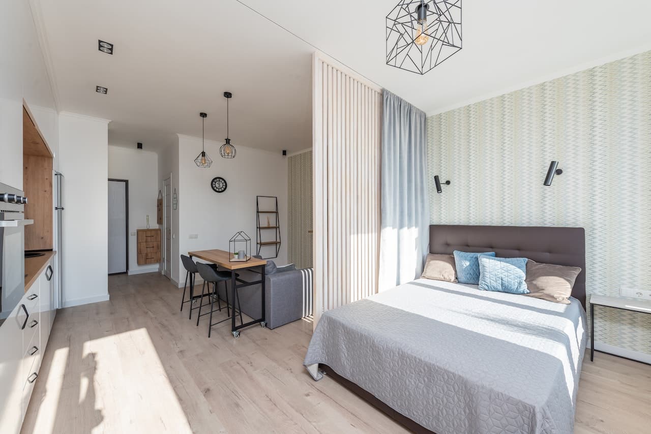 indoor timber interior Bedroom with timber flooring